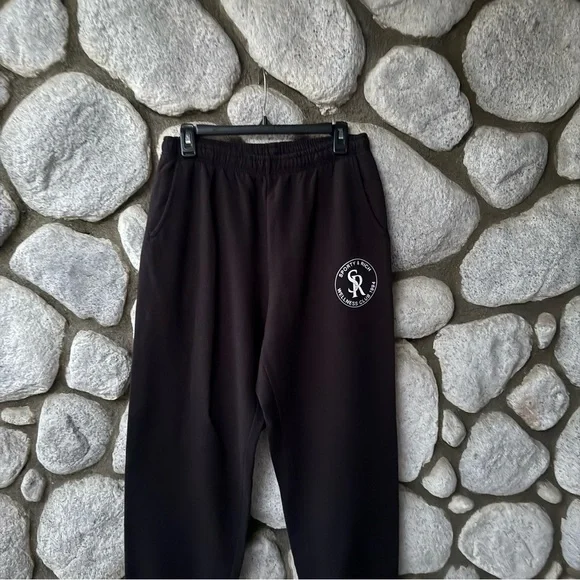 Sporty & Rich Black Wellness Club 1994 Sweatpants